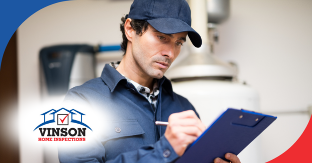 Vinson Home Inspections (7) Inspector taking notes during a home inspection.