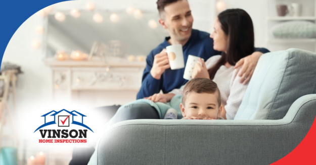 Vinson Home Inspections (9) Young family relaxing on a cozy couch, sharing a warm moment at home.