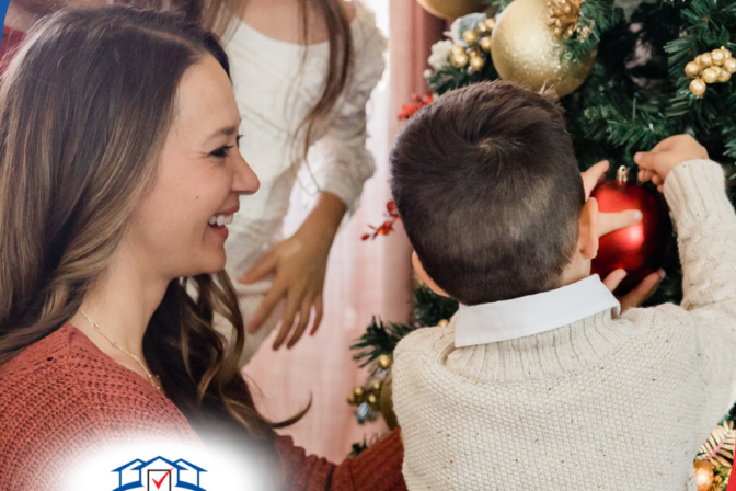 Vinson Home Inspections (11) A joyful family decorating their Christmas tree together