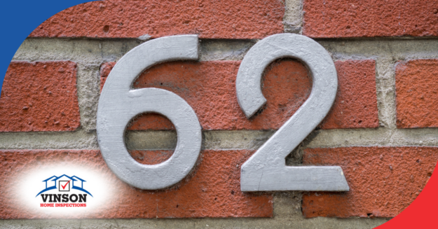 Vinson Home Inspections Gray house number 62 on a red brick wall