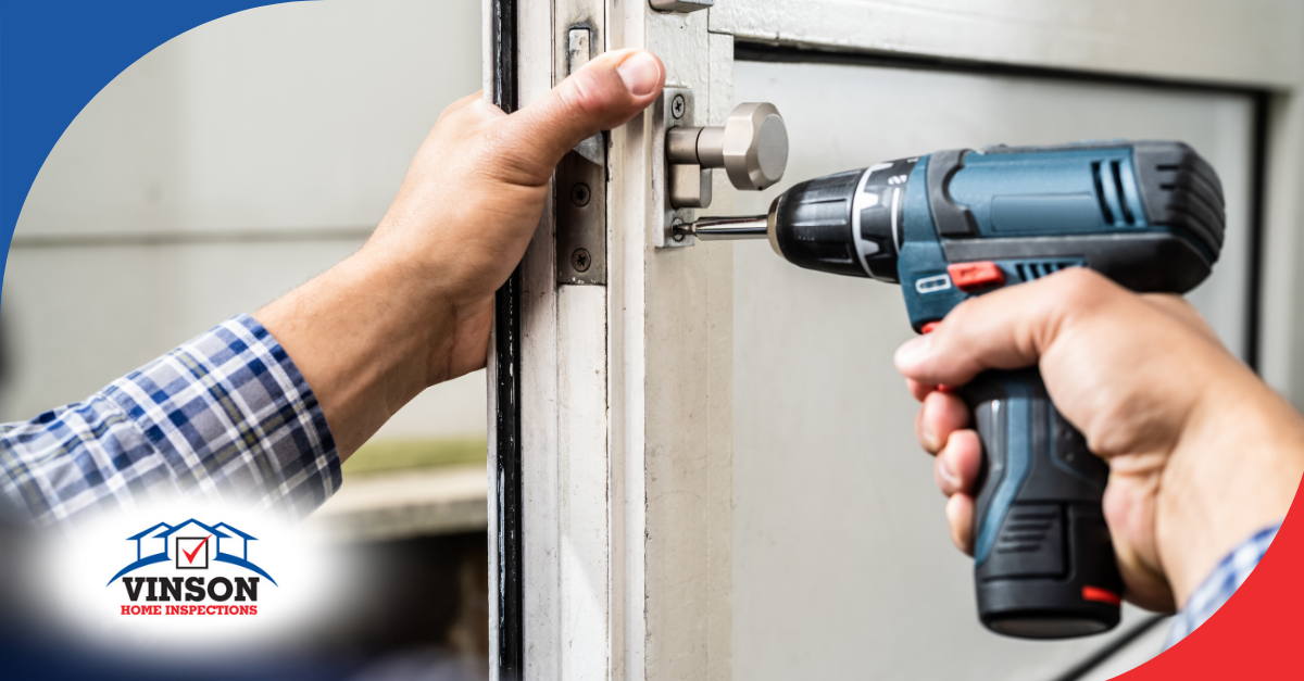 Person tightening a door latch with a power drill.